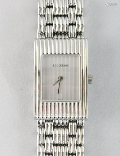 A GOOD BOUCHERON WRISTWATCH in a white leather pou…