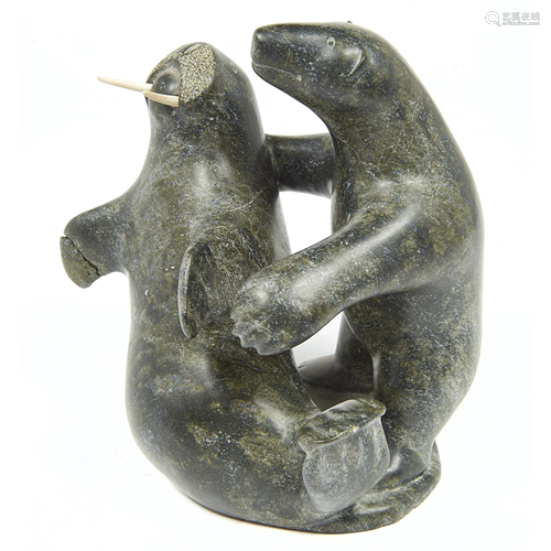 A green soapstone Inoucdtouac bear and walrus sculpture