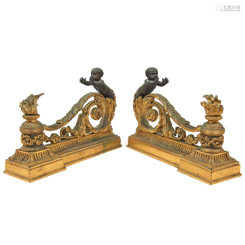 A pair of French dore and patinated bronze chenets