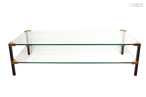 A tiered glass cocktail table