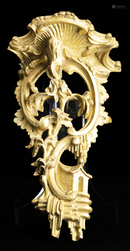 An English giltwood and gesso carved wall bracket circa