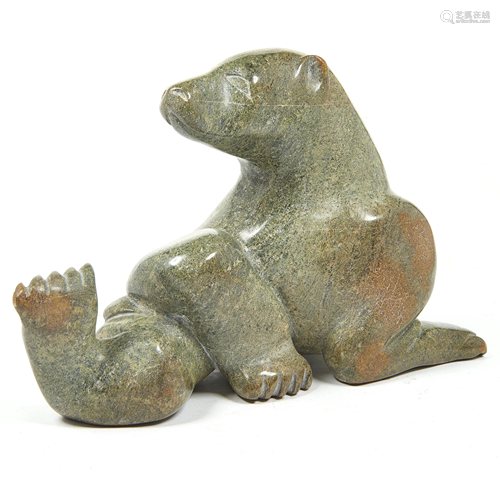 An Inuit sculpture by Komwartok Ashoona