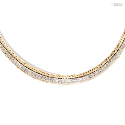 A diamond and fourteen karat gold necklace