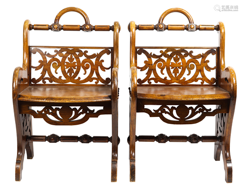 A pair of English Victorian mahogany hall stools