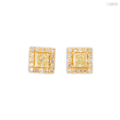 A pair of yellow and near colorless diamond and