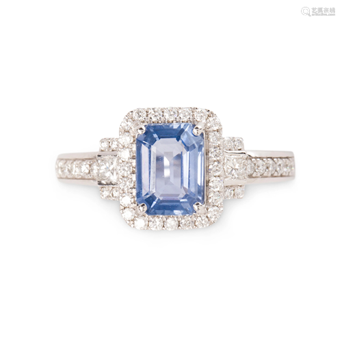 A sapphire, diamond and platinum ring