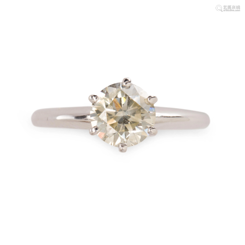 A diamond and fourteen karat white gold ring