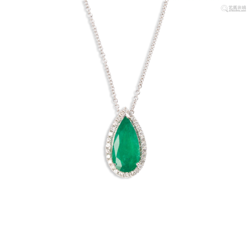 An emerald, diamond and eighteen karat white gold