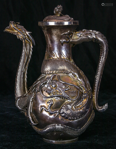 A Chinese Export dragon silver teapot