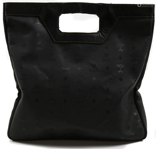 An MCM handbag executed in black nylon monogram