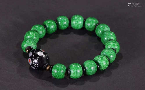 TIBETAN GLASS CARVED BRACELET