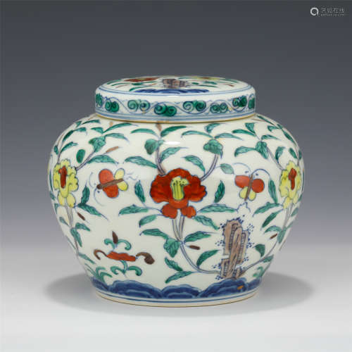A SMALL CHINESE DOUCAI FLOWER PATTERN PORCELAIN JAR AND COVE...