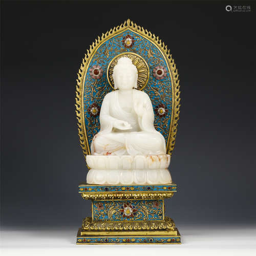 A CHINESE CLOISONNE CARVED JADE SEATED GUANYIN IN NICHE/QING...