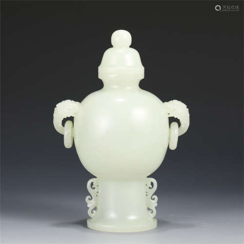 A FINE CHINESE CARVED JADE DOUBLE LOOP HANDLE VASE/QING DYNA...