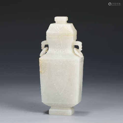 A CHINESE CARVED JADE DOUBLE LOOP HANDLE SQUARE VASE AND COV...