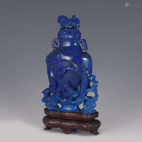 A CHINESE CARVED LAPIS DRAGON PATTERN VIEWS VASE AND COVER/Q...