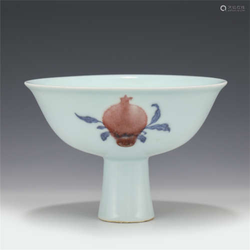 A CHINESE BLUE AND WHITE UNDERGLAZED RED PORCELAIN STEM BOWL...
