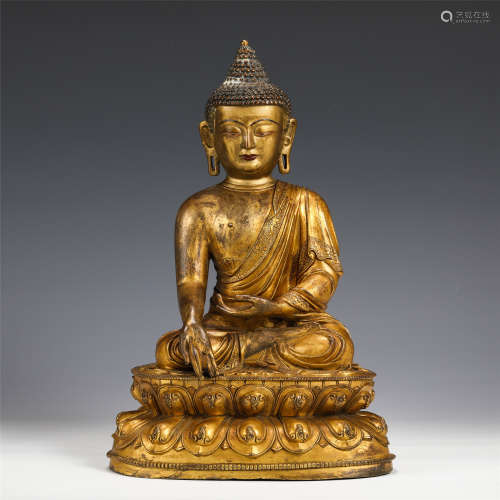 A CHINESE GILT BRONZE BUDDHA ON LOTUS STAND STATUE/QING DYNA...