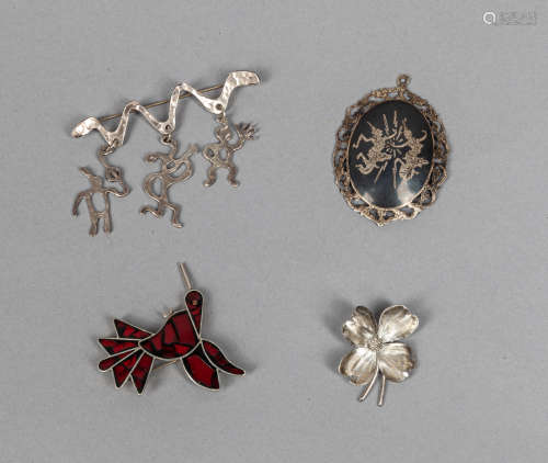 Set Designed Silver Brooches
