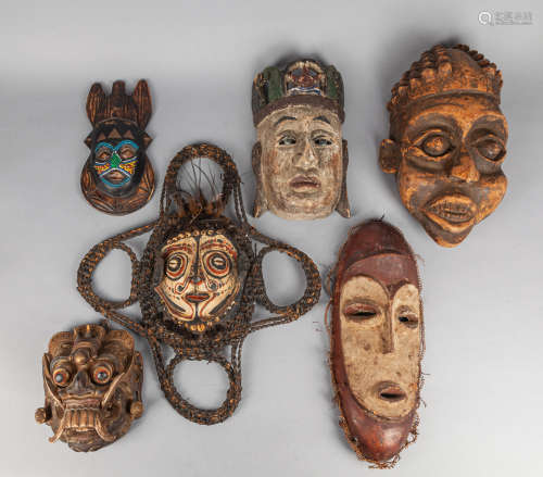 Collection of Old Wall Hanging Wood Masks