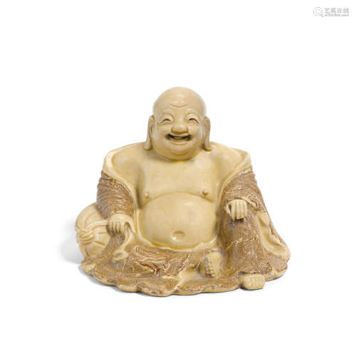 A marble slip-decorated figure of Budai Late Ming dynasty