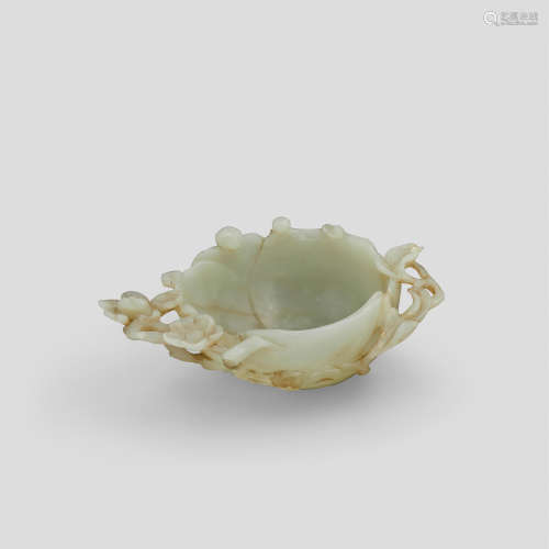 A carved white jade brush washer Ming dynasty