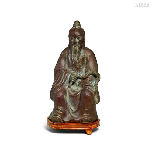 A cast bronze Daoist figure