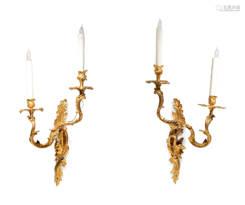 A Pair of Louis XV Style Gilt Bronze Wall Lights with a