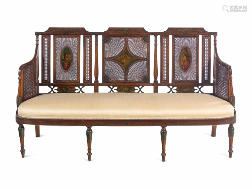 An Edwardian Painted Satinwood Caned Settee