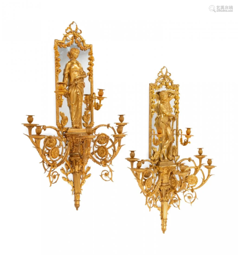 A Pair of Large Louis XVI Style Mirrored Gilt Bronze