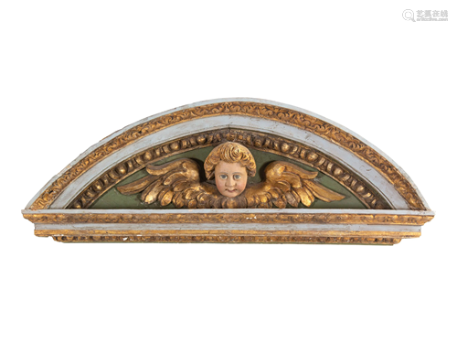 A Baroque Painted and Parcel Gilt Transom Ornament