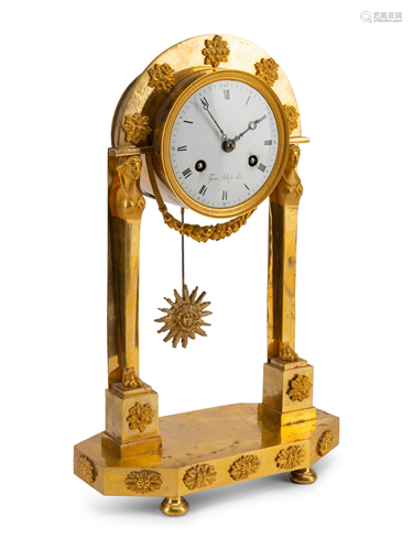 An Empire Gilt Bronze Clock