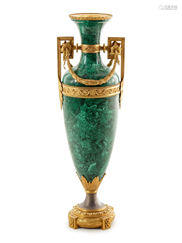 A Louis XVI Style Gilt Metal Mounted Malachite Veneered