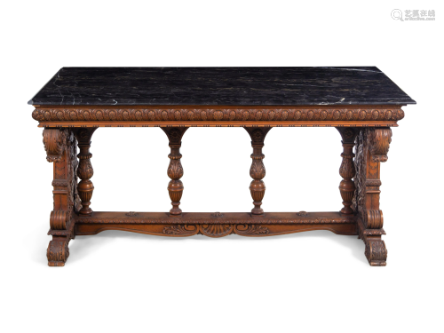 A Karpen Renaissance Revival Carved Oak Marble-Top