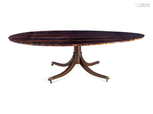 A Regency Style Macassar Ebony Oval Dining Table Top on