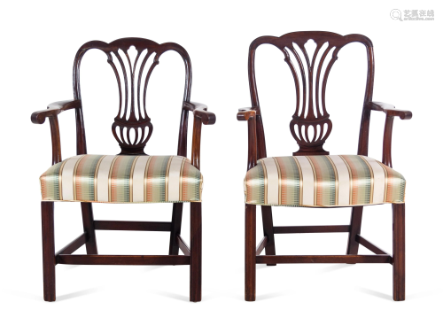 A Pair of George III Carved Mahogany Armchairs