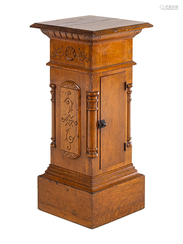 An Aesthetic Movement Carved Oak Pedestal