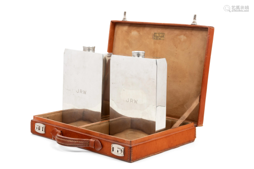 A Leather-Cased Set of Silver-Plate Flasks Retailed by