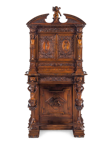 A Renaissance Revival Carved Walnut Cabinet on Stand