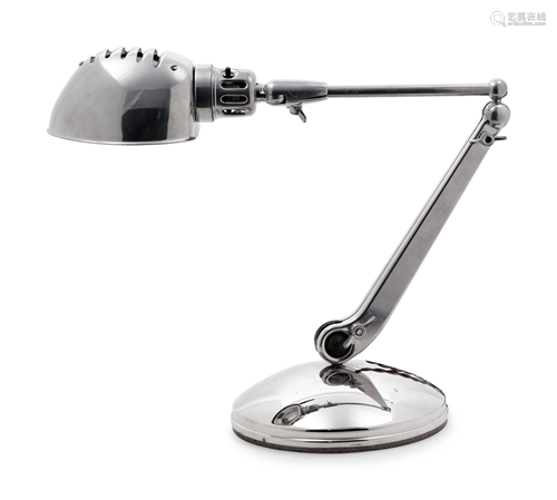 A Chromed Metal Articulated Desk Lamp