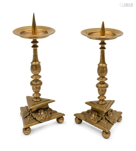 A Pair of Dutch Brass Candlesticks
