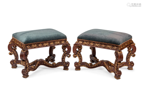 A Pair of Italian Baroque Style Carved and Parcel Gilt