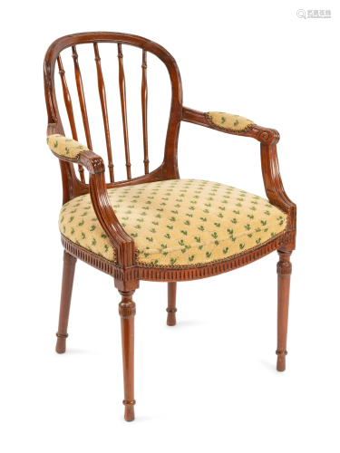 An Italian Neoclassical Walnut Armchair with