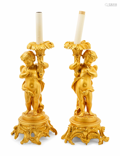 A Pair of Louis XV Style Gilt Bronze Putto Lamps