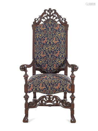 An Italian Baroque Style Carved Walnut Armchair