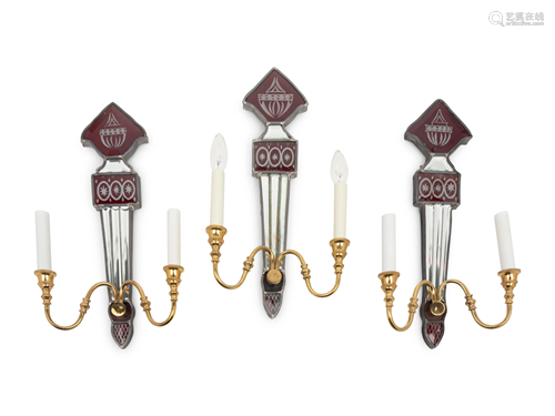 A Set of Three Mirrored, Red Glass and Brass Two-Light