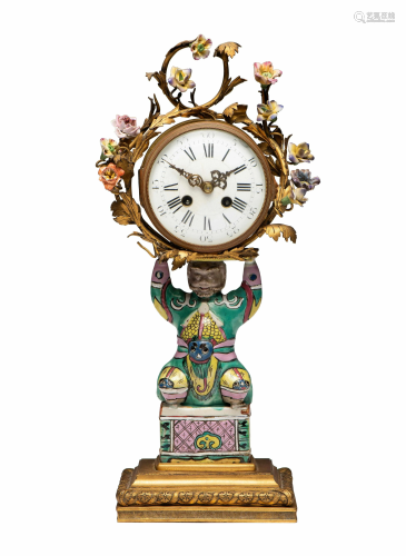 A French Gilt Bronze and Porcelain Mantel Clock