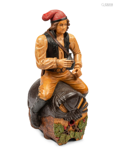 A Continental Painted Figure of a Man on a Barrel