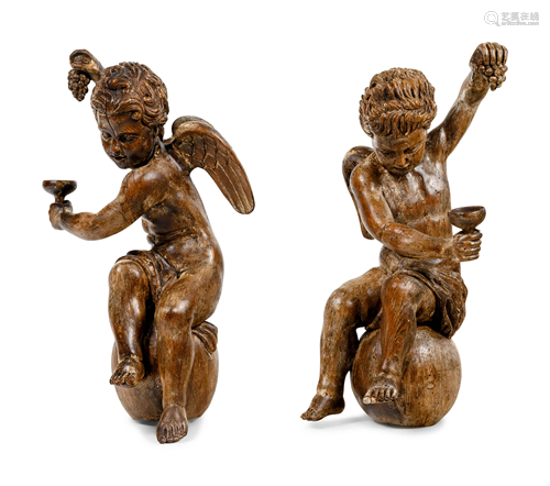 A Pair of Continental Carved Oak Cherubs