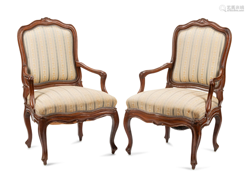 A Pair of Louis XV Walnut Fauteuils